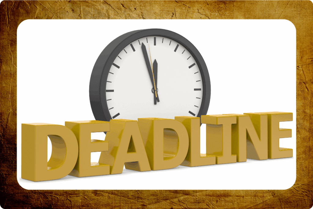 Eine große Uhr vor der der Schriftzug Deadline steht